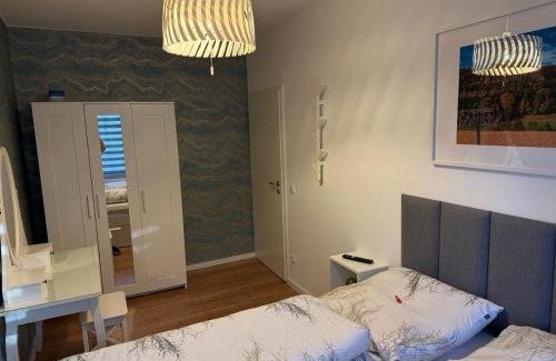 Krippen Apartamento | Ferienwohnung Lucy - Moderne Ferienwohnung mit kostenlosem Parkplatz, Terrasse, nahe Bad Schandau und Malerweg