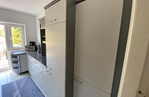 Flensburg Apartamento | Ferienwohnung mit Balkon und Garten OG