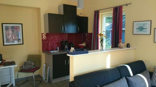 Wiefelstede Apartamento | Ferienwohnung Sommerhus