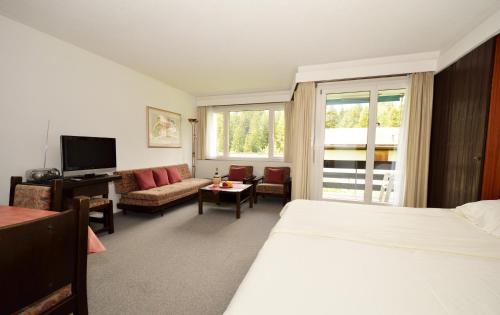 Lenzerheide Apartamento | Ferienwohnungen Chesa Clois 24 Studios