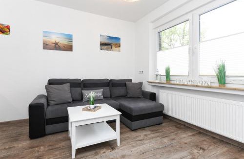 Neuharlingersiel Apartamento | Ferienwohnungen Haus Boje "Wattwurm"