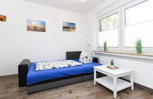 Neuharlingersiel Apartamento | Ferienwohnungen Haus Boje "Wattwurm"
