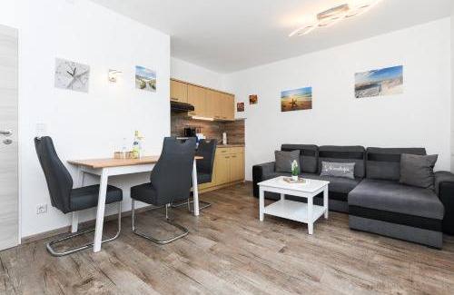 Neuharlingersiel Apartamento | Ferienwohnungen Haus Boje "Wattwurm"