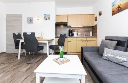 Neuharlingersiel Apartamento | Ferienwohnungen Haus Boje "Wattwurm"