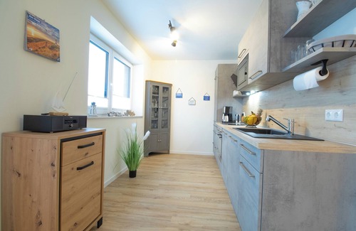 Dorumer Neufeld Apartamento | Fewo Seebrise mit Sauna und Balkon