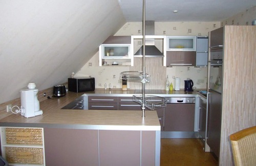 Neuharlingersiel Apartamento | FEWO2 para familias, también con un perro, vista del dique y un corto paseo a la playa.