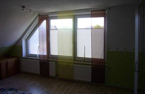 Neuharlingersiel Apartamento | FEWO2 para familias, también con un perro, vista del dique y un corto paseo a la playa.
