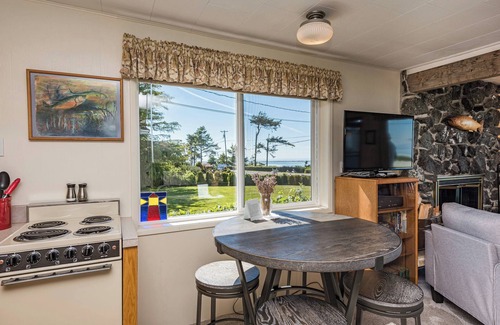 Sequim Casa | Fireplace Room - Water view, Jetted tub, King, Kitchen