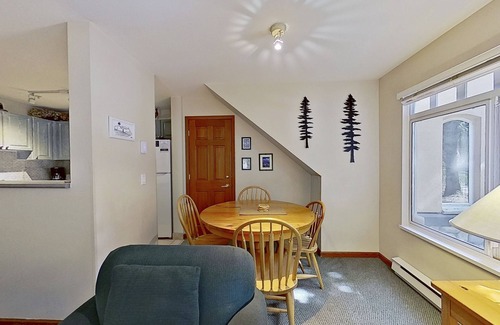 Village North Condominio | First-floor condo with fireplace & patio - walk or shuttle to ski lifts