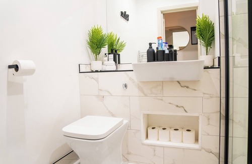 Sutton Central Apartamento | Five star boutique studio apartment.