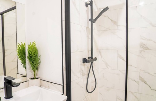 Sutton Central Apartamento | Five star boutique studio apartment.