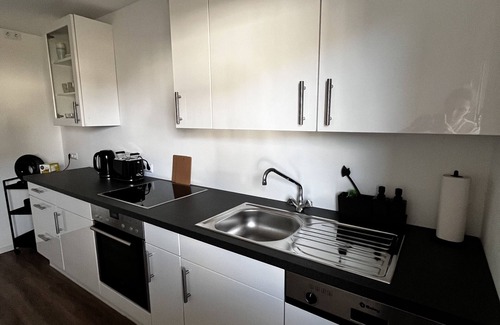 Huesten Apartamento | Flammberg.apartment