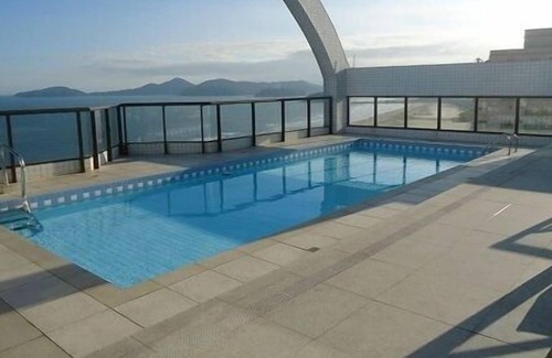 Boqueirao Apartamento | Piso 1 cama Boqueirão de 43m2 - frente al mar con garaje, aire acondicionado y servicios