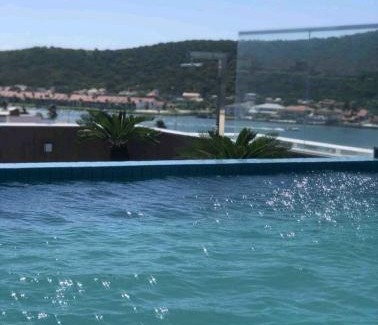 Passagem Apartamento | Flat 313 na melhor localização de Cabo Frio