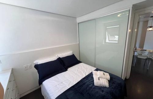 Boqueirao Apartamento | Flat moderno com vista para o mar e varanda!