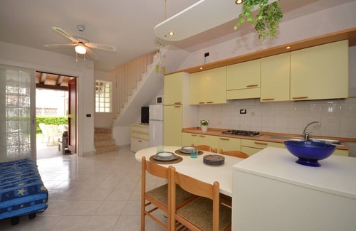 Bibione Lido dei Pini Apartamento | Piso con piscina comunitaria y jardín privado