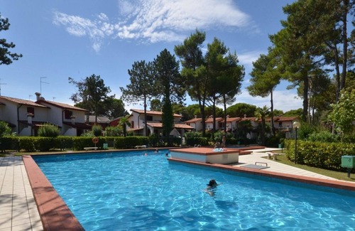 Bibione Lido dei Pini Apartamento | Piso con piscina comunitaria y jardín privado