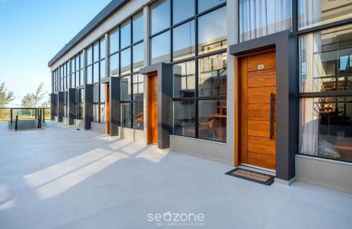 Jaguaruna Apartamento | Flats completos e modernos em Jaguaruna a 50m da Praia - PLO