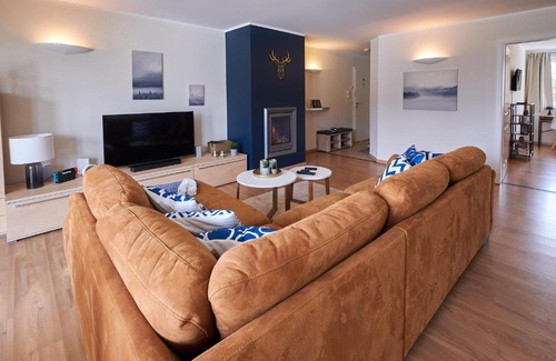 Muritz Apartamento | FLEESENTRAUM Seeadler Grand Maisonette - Für Golfer und Familien - Sauna Kamin Balkon Nintendo - Hunde willkommen!