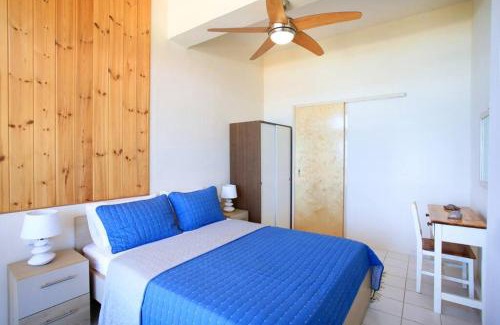 Kokkini Chani Apartamento | Flokos. Lazy days, balmy nights on the seafront