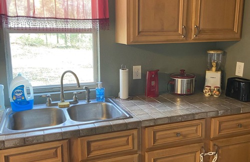 Pinetta Cabaña | ROOF DAMAGE FROM HURRICANE Florida Waterfront Home, Fishing & Pet Friendly