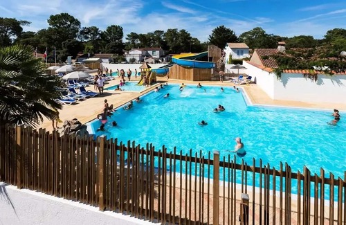 Les Conches Casa | Flower Camping Les Dunes **** - Mobil Home Standard 22m2- 2 bedrooms - Small terrace + TV 4 persons
