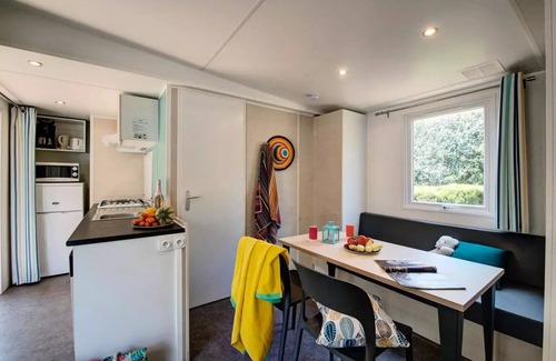 Saumur Casa | Flower Camping L'Ile d'Offard **** - Homeflower Premium 26.5m2 (2 bedrooms) + CLIM + semi-covered terrace + TV + sheets + towels 5 people