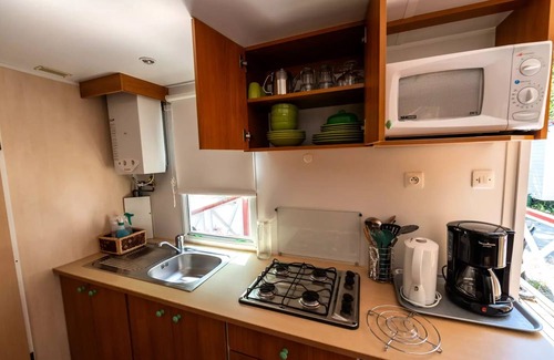 Die Casa | Flower Camping la Pinède **** - Mobile home Standard Getaway 23m2 - 2 bedrooms + Terrace with umbrella - 4 people