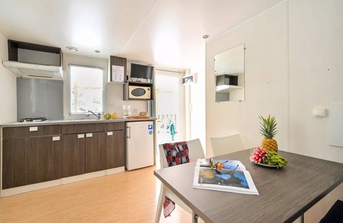 Castries Casa | Flower Camping le FONDESPIERRE *** - Mobile-home Standard - 23m2 (1 bedroom - air conditioning - TV) 2 persons