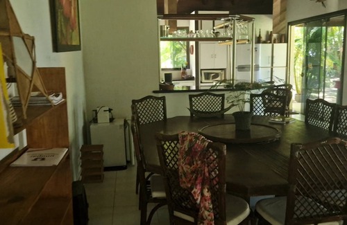 Guaiu Casa | Flower house on the edge of Guaiú beach in a high-standard condominium.