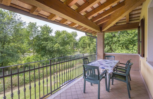 Palazzolo dello Stella Apartamento | Folaghe 3, apartamento con terraza con vistas al bosque