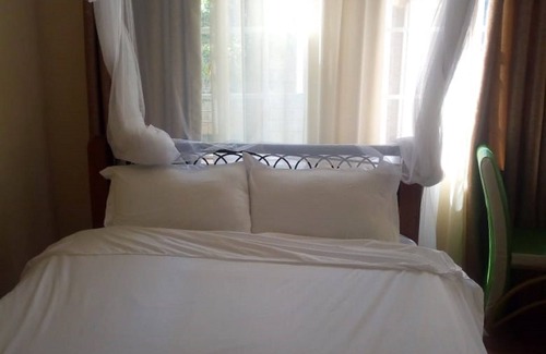 Riruta Cama Y Desayuno | Forest Breeze Gardens