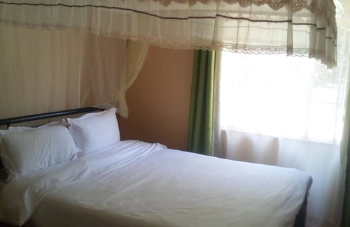 Riruta Cama Y Desayuno | Forest Breeze Gardens