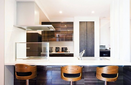 Isumi Casa | Four bedrooms provide private space perfect for g / Isumi Chiba
