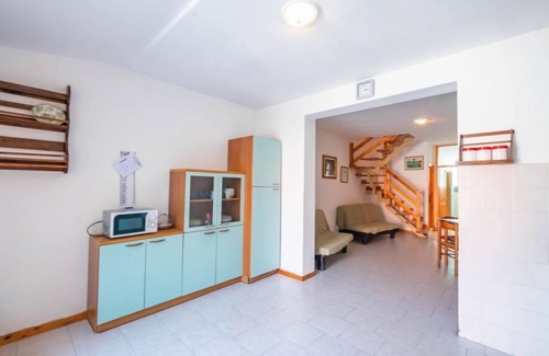 Lido delle Nazioni Villa | Villa vertical con jardín de azulejos para 8 personas con dos balcones.