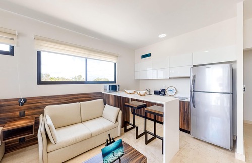 Barrio Zama Apartamento | Fourth-floor studio with rooftop pool, partial A/C, city views, & balcony