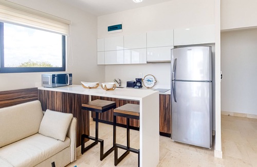 Barrio Zama Apartamento | Fourth-floor studio with rooftop pool, partial A/C, city views, & balcony
