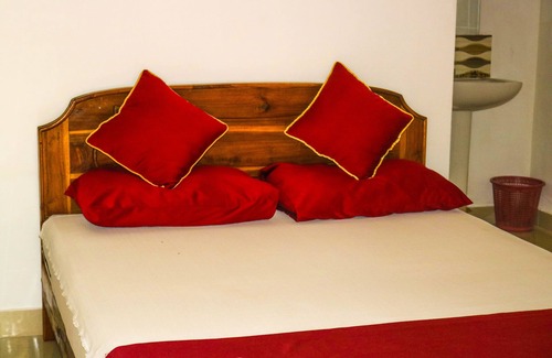Uppuveli Hotel | French Garden Eagle wings Inn