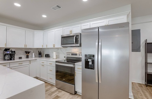Riverview Casa | Friendly Getaway Home w/ Backyard & Firepit for Extended Stays near Downtown KC