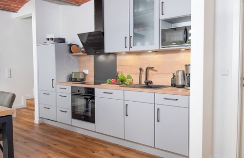 Krummhoern Apartamento | Frohsinn vacation apartment in the historic Gulfhof