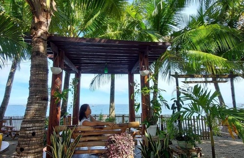 Carles Complejo | Front Beach Cottages Rental Breakfast included