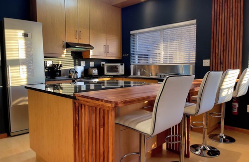 De Kelders Apartamento | Cómodo apartamento totalmente equipado con cocina, a pasos de la costa.