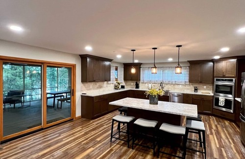 Rock Harbor Casa | Fully Remodeled Lakefront Home with a Dock