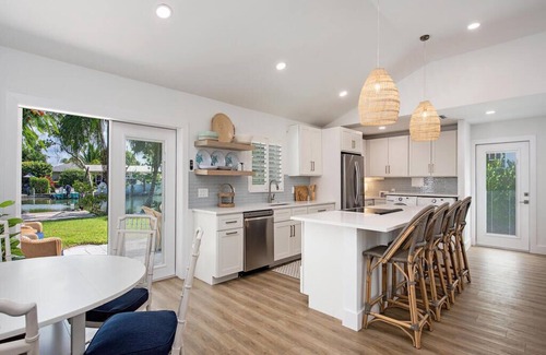 Isles of Capri Casa | Fully remodeled water front home with boat dock
