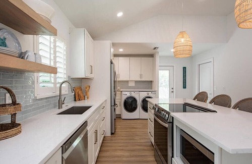 Isles of Capri Casa | Fully remodeled water front home with boat dock