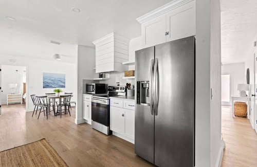 Palm River Estates Casa | Fully Updated Lake Front Home With Heated Pool!