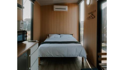 Fuxing Casa | Fulu Dragon Boat Camping House 1 by Tiny Away