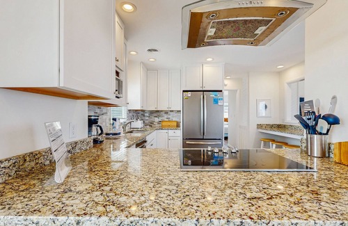 Avon Casa | Fun beachfront home w/shared pool, WiFi, private washer & dryer, central AC