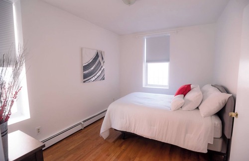 Dudley Square Casa | Furnished 3- Bedrooms near Hospitals & Universities in vibrant Boston w/ Wifi.