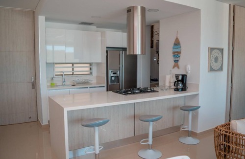 Pozos Colorados Apartamento | APARATAMENTO AMOBLADO CON SALIDA DIRECTA A LA PLAYA Y UN MUELLE SOBRE EL LAGO